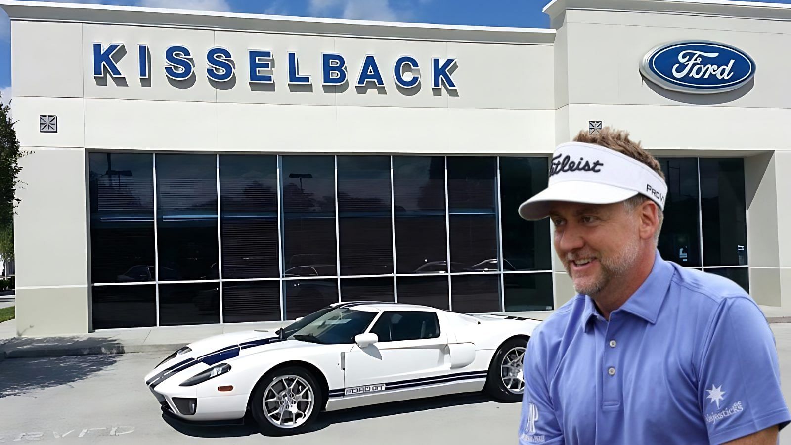 white 2005 Ford GT parked outside ford showroom with a cutout of Ian Poulter 