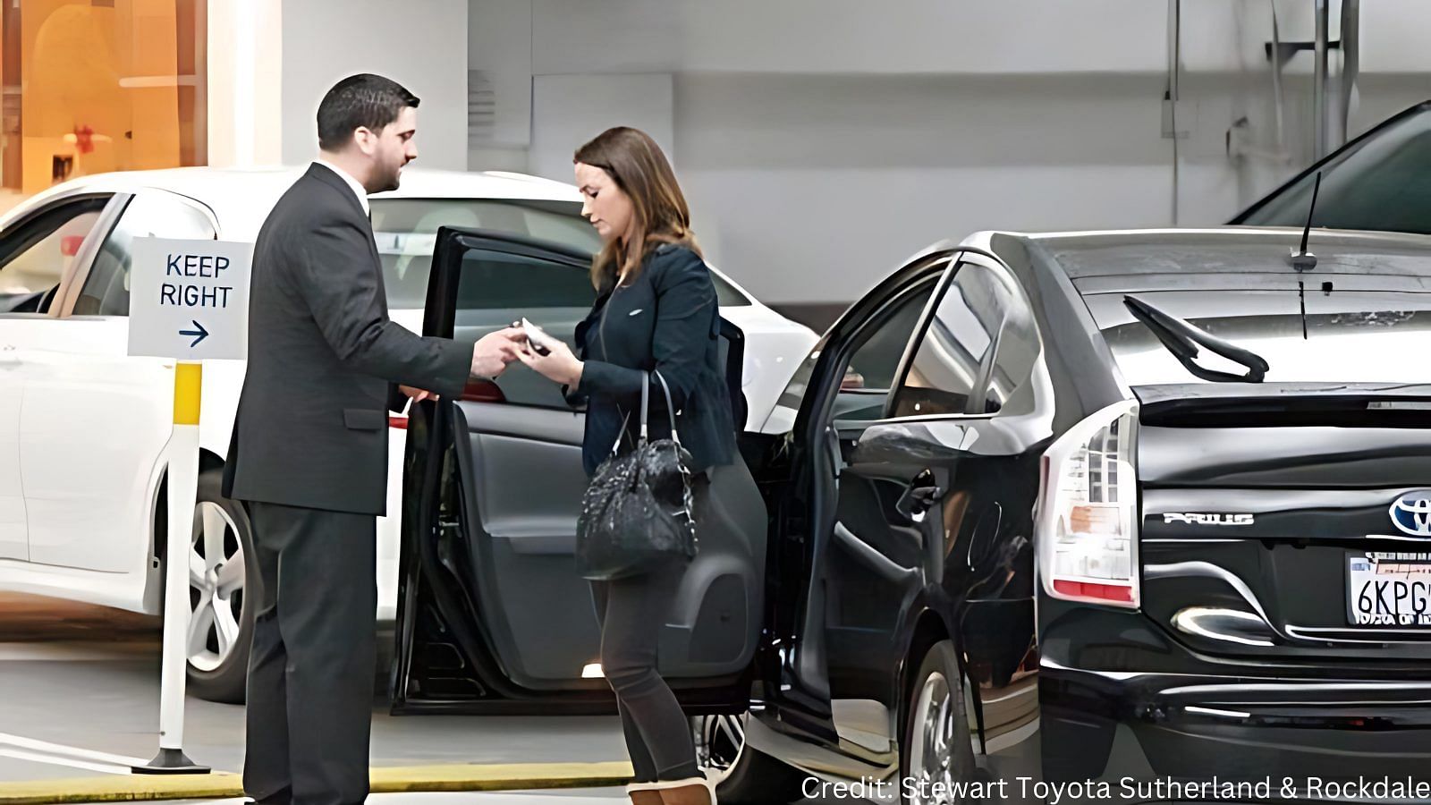 Emily Blunt with her black Toyota Prius