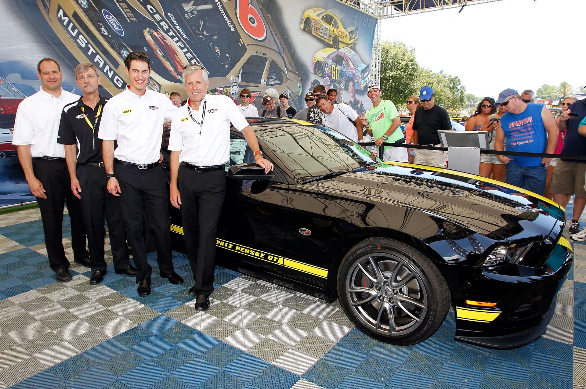 Joey Logano and his 2014 Ford Mustang Hertz-Penske GT