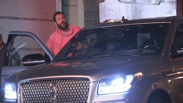 Adam Sandler Driving His Lincoln Navigator