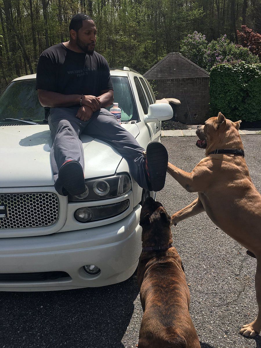 Ray Lewis with his GMC Yukon Denali