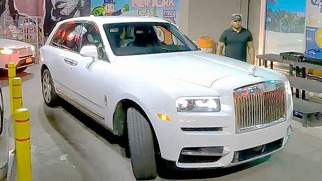 ASAP Rocky driving his white Rolls Royce Cullinan