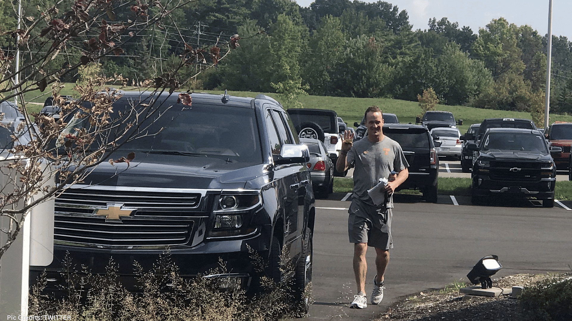 Peyton Manning with his Chevrolet Suburban 