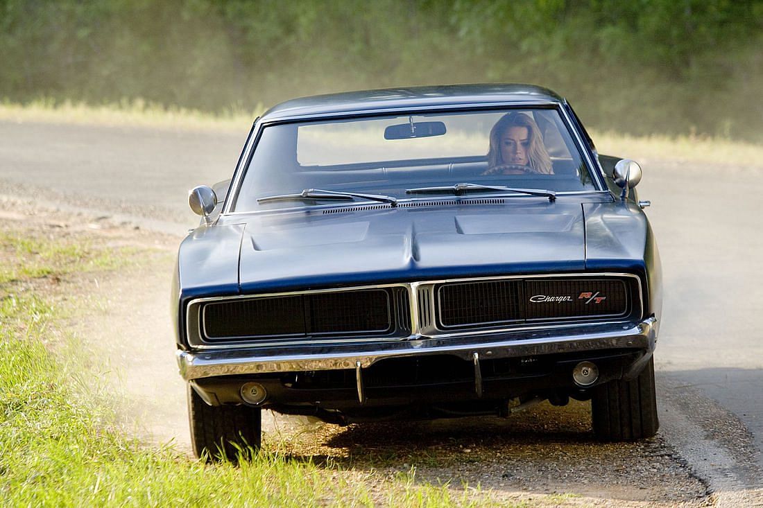 1969 black Dodge Charger RT with Amber Heard