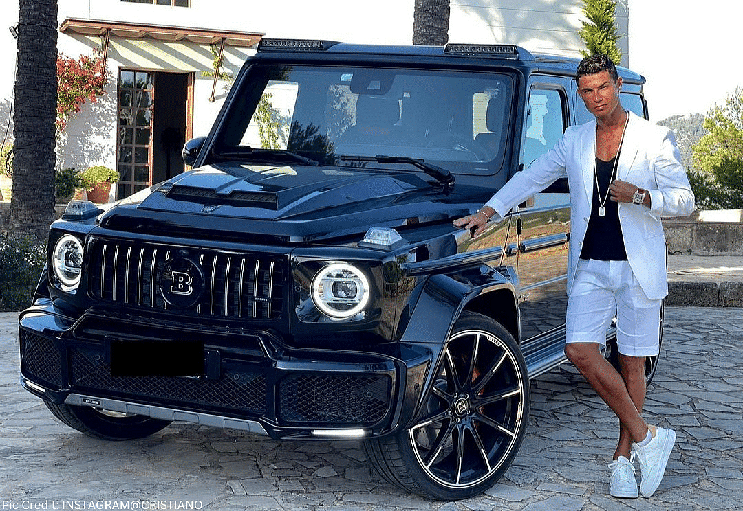 Cristiano posing with his black 2020 Brabus G-Class W463 AMG G65