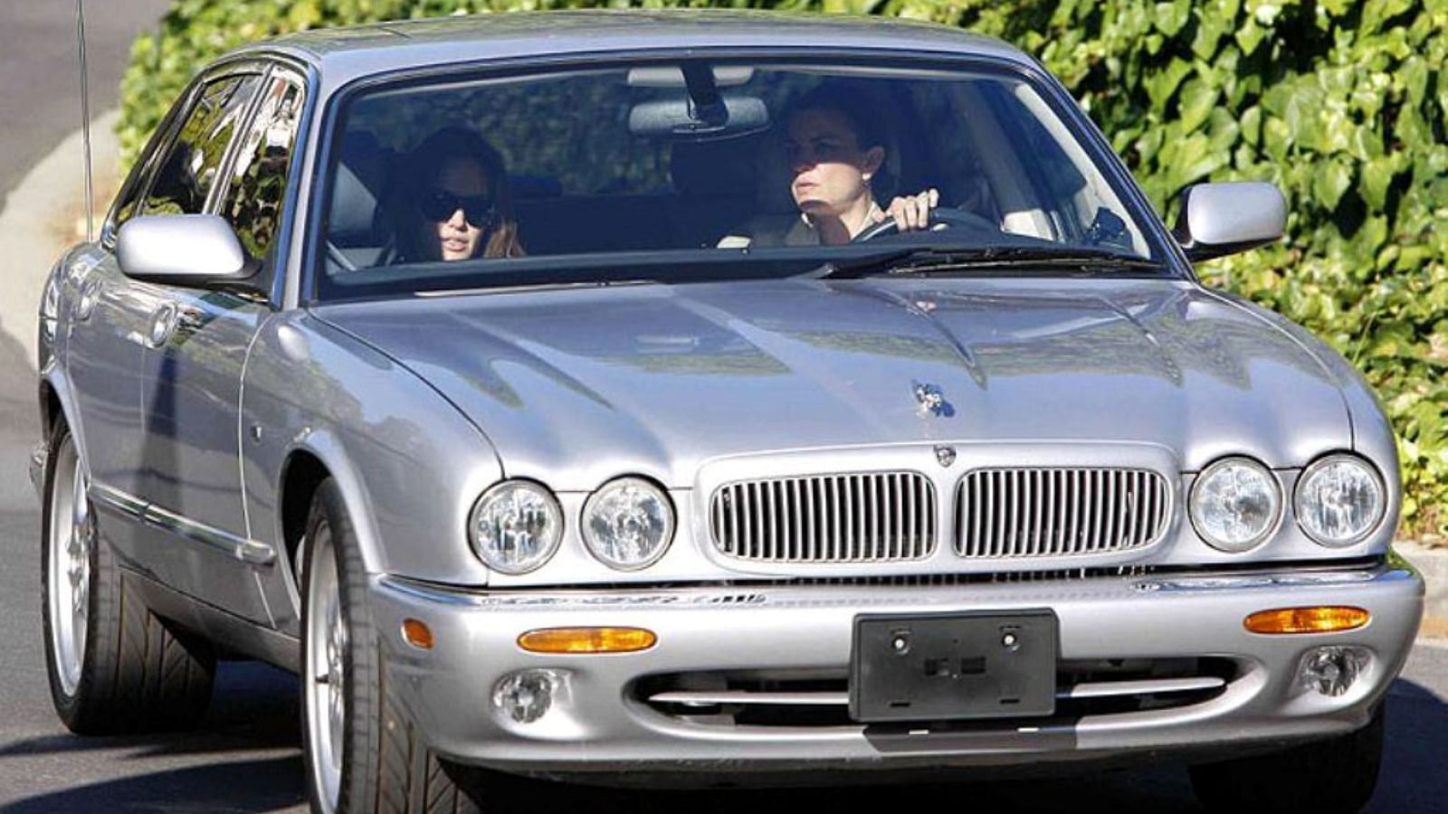 Angelina Jolie in her silver Jaguar XJ