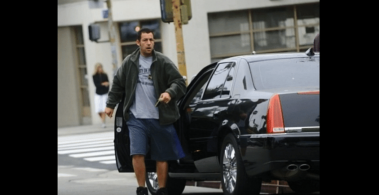 Adam Sandler with his Cadillac DTS Sedan