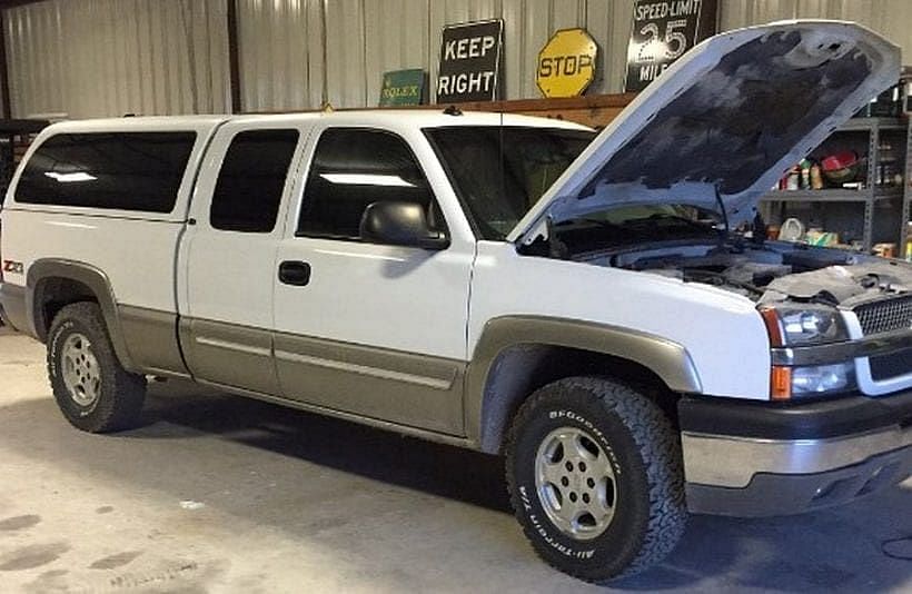 Steve Austin’s white 2003 Chevrolet Silverado Z71 at a workshop